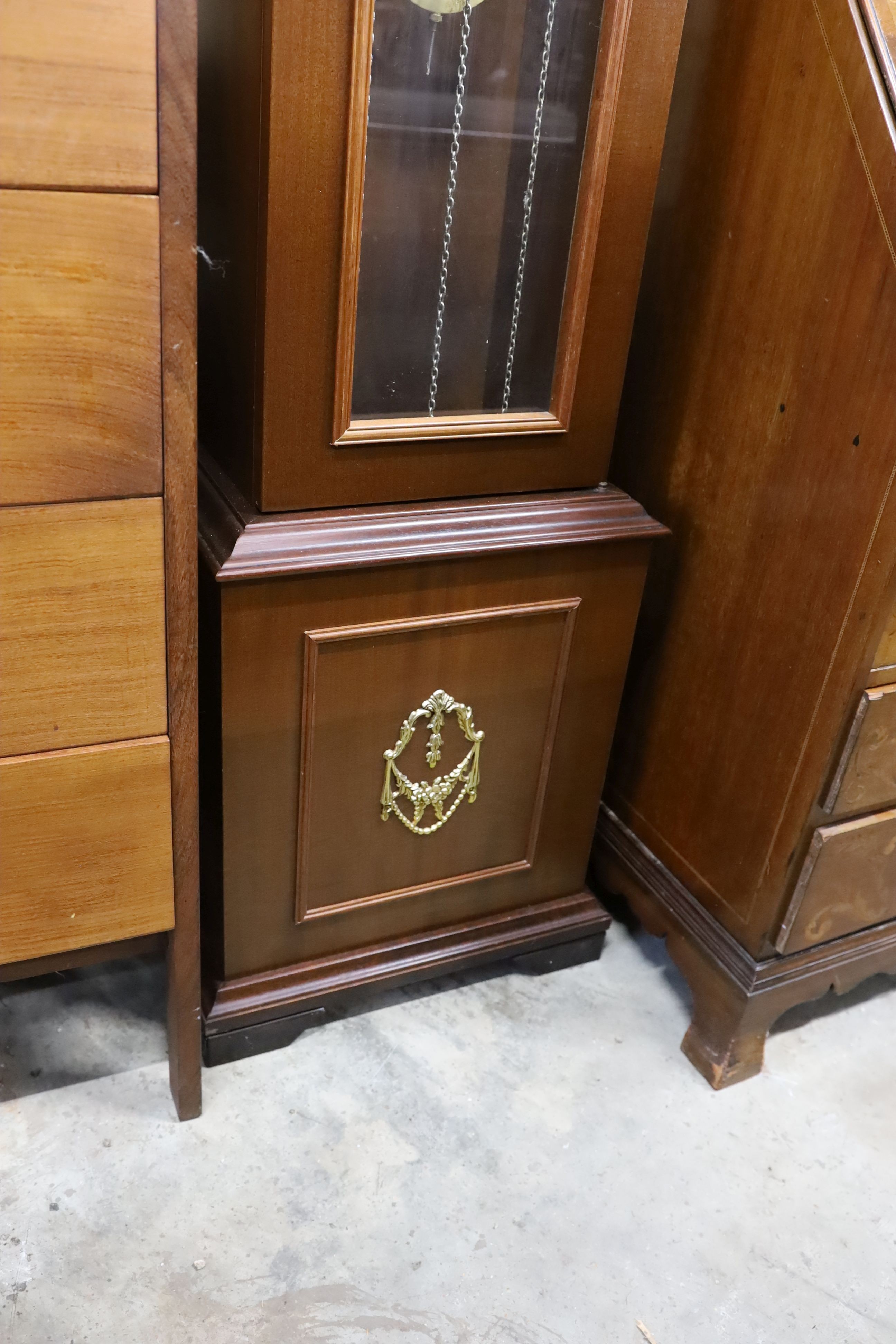 A reproduction German mahogany 'Tempus Fugit' longcase clock, height 215cm